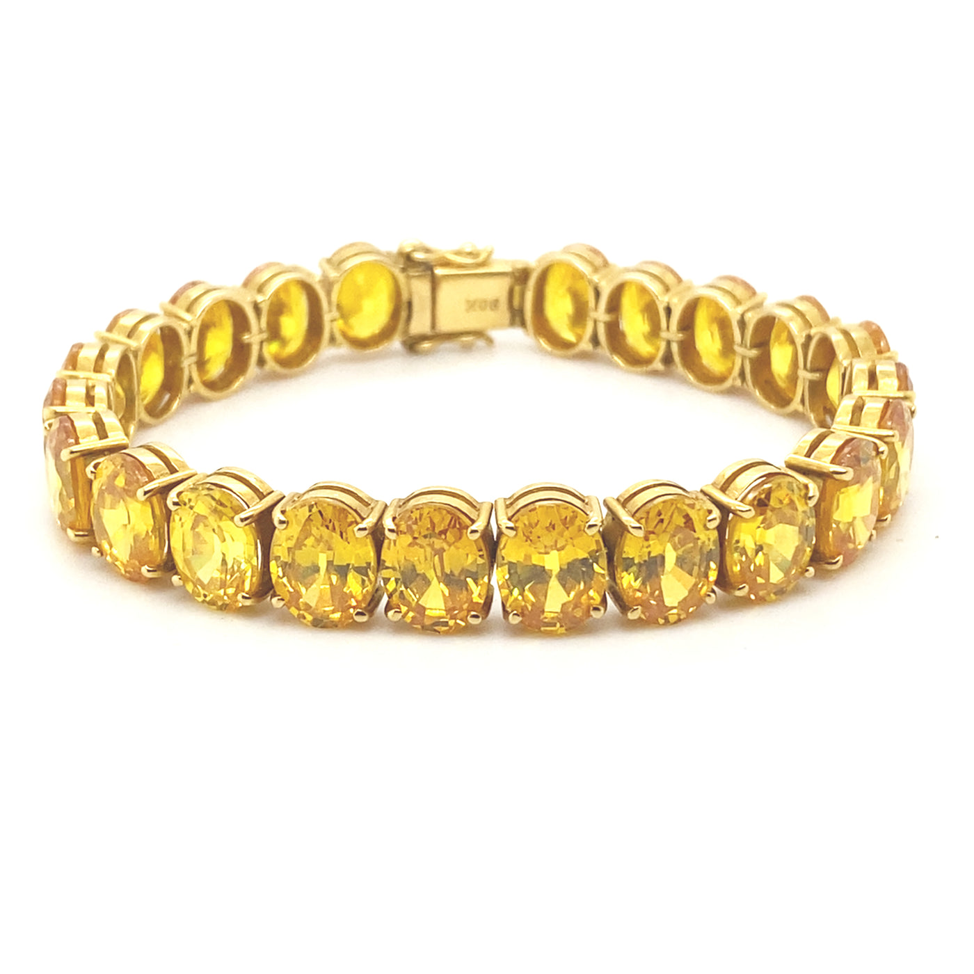 Goldenes Armband mit faszinierenden Orange-Gelben Farbsteinen