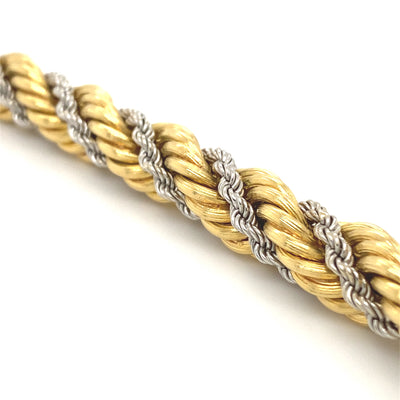 Opposites Attract - Bicolor Goldarmband geflochten