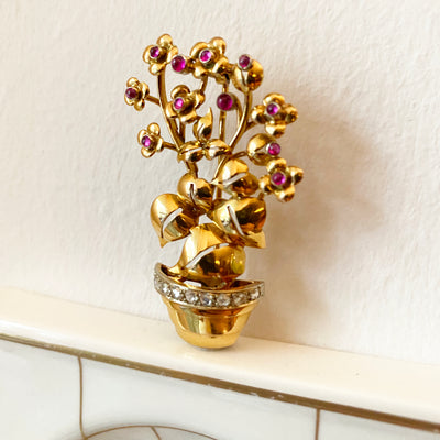 Blooming Beauty - Goldener Blumentopf mit Farbsteinen